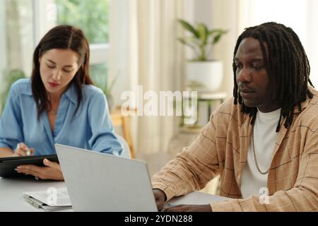 Collaborating on Business Project in Office Setting Stock Photo
