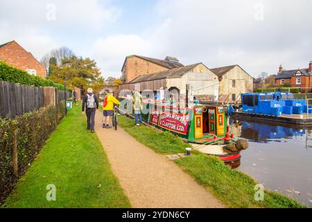 Former Fellows Morton and Clayton canal narrowboat on the Shropshire union canal as it passes through the Shropshire market town of Market Drayton Stock Photo