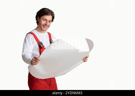 Repairing Worker Checking Blueprint, Holding Project Plan In Hands And Smiling Stock Photo