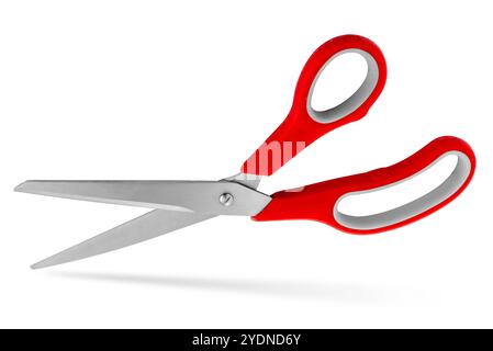Stainless steel scissors with red plastic handles isolated on white with clipping path included Stock Photo