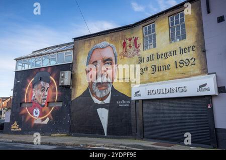 Murals of Luiz Diaz and John Houlding (the founder of Liverpool FC) pictured on the side of a pub at Anfield, Liverpool on 27 October 2024. Stock Photo