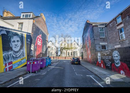 Four murals of famous Liverpool Football Club players pictured in a road in Anfield, Liverpool on 27 October 2024.  These comprise Jan Molby, Trent Al Stock Photo