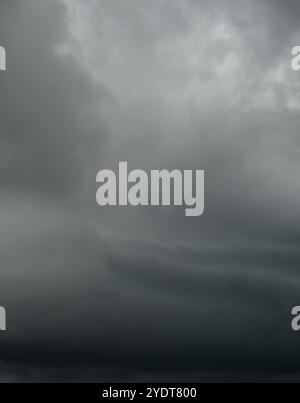 Cumulonimbus cloud formations on tropical sky , Nimbus moving , Abstract background from natural phenomenon and gray clouds hunk , Thailand Stock Photo