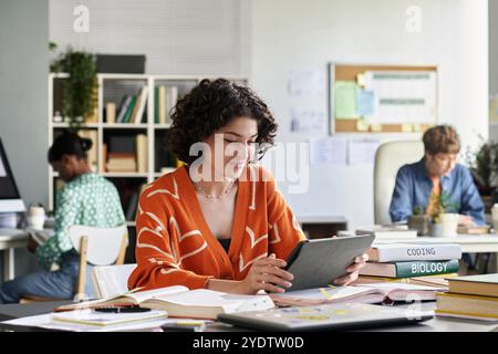 Studying and Working in a Collaborative Office Space Stock Photo