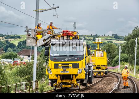 Overhead line maintenance on rail tracks Stock Photo