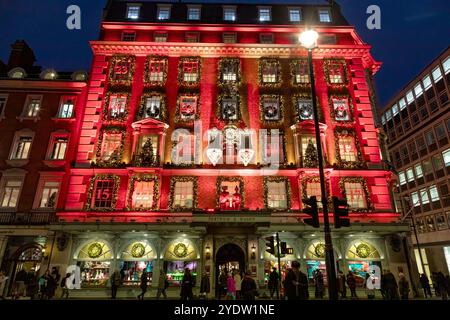 London, UK - 1 Dec 2019: Front facade of the iconic Fortnum and Mason store in Mayfair, London. The exterior has been decorated as an advent calendar Stock Photo