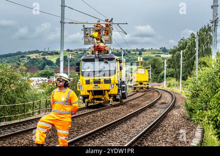 Overhead line maintenance on rail tracks Stock Photo
