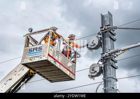 Overhead line maintenance on rail tracks Stock Photo