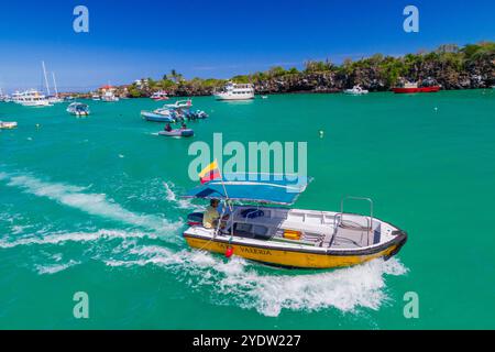 Scenic view of boats at the port town of Puerto Ayora, Santa Cruz Island, Galapagos Island Archipelago, UNESCO World Heritage Site, Ecuador Stock Photo