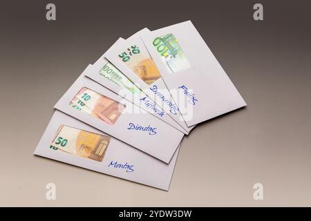 Cash stuffing, organising private finances Stock Photo