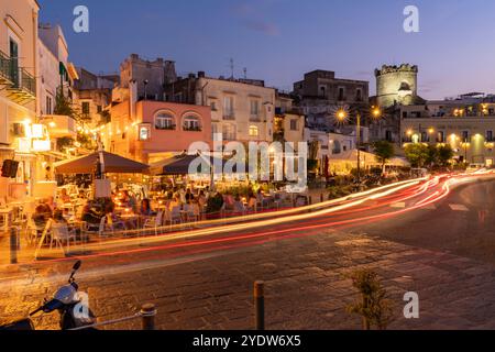 View of cafes and bars on Via Marina at dusk, Forio, Island of Ischia, Campania, Italy, Europe Stock Photo