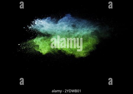 Launched blue green color powder explosion on black background Stock Photo
