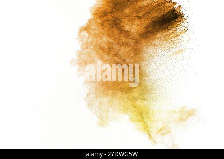 Orange and yellow powder explosion on white background.Orange yellow color dust splash clouds Stock Photo