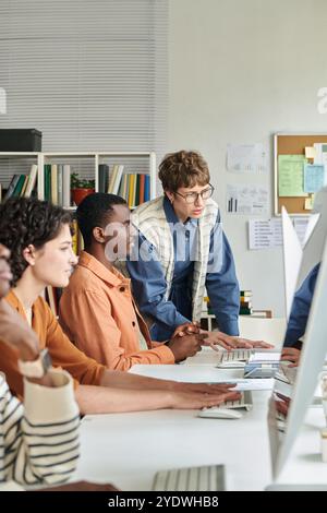Conducting Team Meeting in Modern Office Environment Stock Photo