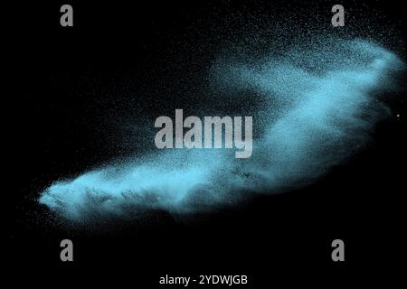 Green sand explosion isolated on black background Stock Photo