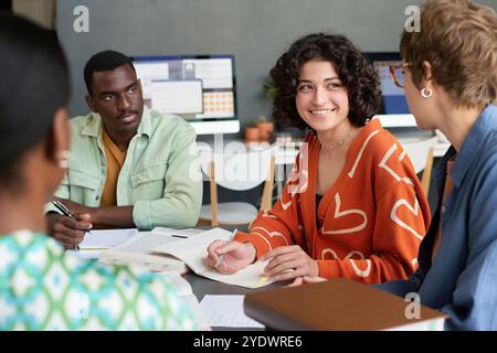 Collaborating in Modern Office Setting with Laptops Stock Photo