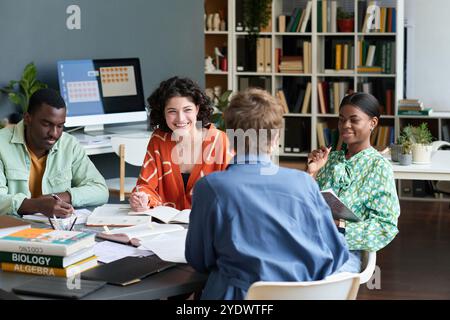 Collaborating in Modern Office Setting with Diverse Group Stock Photo