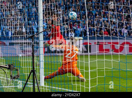 sports, football, Bundesliga, 2024/2025, VfL Bochum vs. FC Bayern Muenchen 0-5, Vonovia Ruhr Stadium, scene of the match, 0-2 goal by header, goal scorer Jamal Musiala (FCB) left, right goalkeeper Patrick Drewes (BO), DFL REGULATIONS PROHIBIT ANY USE OF PHOTOGRAPHS AS IMAGE SEQUENCES AND/OR QUASI-VIDEO Stock Photo