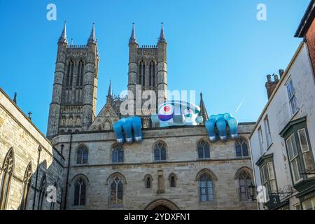 The Lincoln Monster Invasion,  Lincoln Monster Invasion, Lincoln city, Lincoln UK, Lincoln monsters, monsters, monster, monster trail, Lincoln monster trail, inflatable monster, inflatable, Lincoln, Lincolnshire, UK, England, scary monster, gigantic monster, monster invasion, Lincoln cathedrel, Lincoln cathedrel monster, Stock Photo