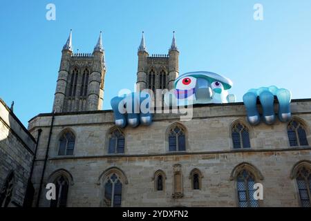 The Lincoln Monster Invasion,  Lincoln Monster Invasion, Lincoln city, Lincoln UK, Lincoln monsters, monsters, monster, monster trail, Lincoln monster trail, inflatable monster, inflatable, Lincoln, Lincolnshire, UK, England, scary monster, gigantic monster, monster invasion, Lincoln cathedrel, Lincoln cathedrel monster, Stock Photo