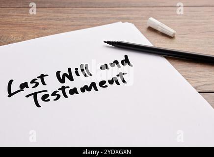 Last will and testament handwritten on a white sheet of paper. Stock Photo