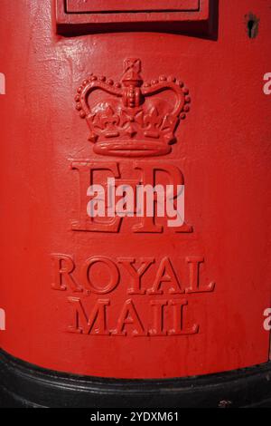 Red Royal Mail post box with ER II cypher. Vintage pillar mail collection box - Southampton UK 23 October 2024 Stock Photo