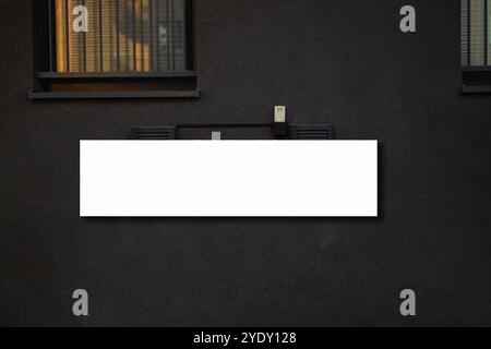 Mockup. Signboard of store, shop. Mock ups Of restaurant street black signboards on black wall Stock Photo