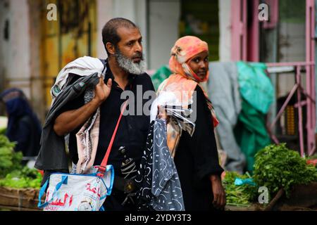 The historic Bab Al- Musa market in the Yemeni city of Taiz becomes very busy with residents shopping during Ramadan. The construction of the market of Bab Musa and the walls of the old city dates back to the Ottoman era in Yemen, with the market developing with the construction of the Bab Al-Musa Gate in the eighth century. Taiz remained a walled city until 1948 when Imam Ahmed allowed for expansion beyond its fortified wall. Taiz, which is located in south-western Yemen, is the third largest city in Yemen, and was its cultural capital until before becoming deeply entangled in the Yemeni conf Stock Photo