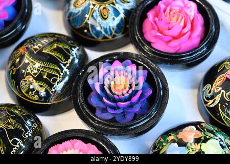 Hand-carved Thai soap flower in a beautifully crafted black wooden decorative case in Railway market  Thailand ,Mae Klong, Bangkok , Asia Stock Photo