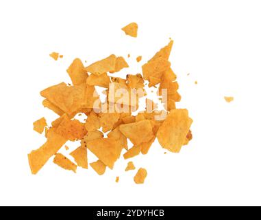 pile nachos chips pieces, yellow pieces chips crumbs isolated on white background Stock Photo