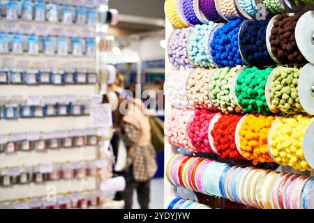 Assortment of colored threads for knitting in decor shop Stock Photo