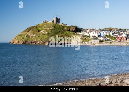 Sun shines on the ruins of Criccieth Castle on the coast of North Wales. Stock Photo