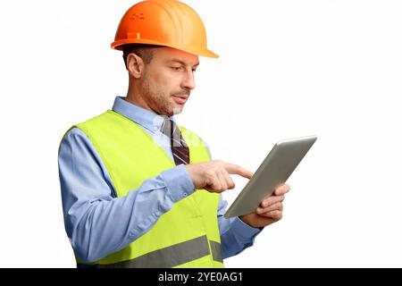 Building Engineer Using Digital Tablet Computer, Studio Shot Stock Photo