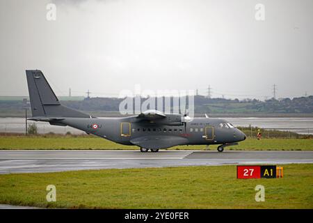 French Air Force CASA CN-235, F-RAIJ, taxiing out of to Runway 27 at LIVERPOOL JOHN LENNON AIRPORT bound for BREST Stock Photo