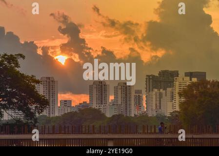 Sunrise and dark clouds at Jurong Lake Gardens in the western part of Singapore. Stock Photo