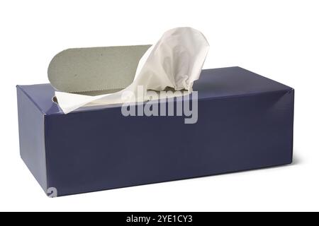 dark blue facial tissue box with perforated opening for soft tissues popped out isolated white background, mock-up template with blank label Stock Photo
