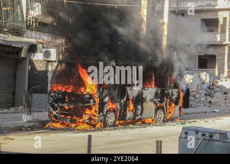 Syrian jets have attacked the besieged town of Aleppo with cluster bombs, causing several deaths and injures and much burning. Stock Photo