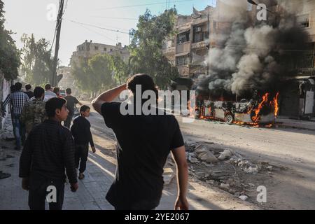 Syrian jets have attacked the besieged town of Aleppo with cluster bombs, causing several deaths and injures and much burning. Stock Photo