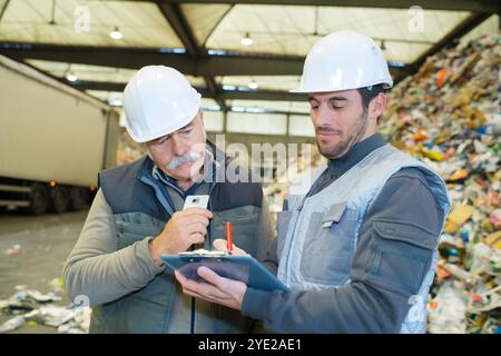 factory worker in recycling plant Stock Photo