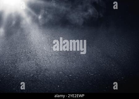 Surface of black concrete floor. Abstract texture with mist or fog. Mockup or template. Copy space. Dark background Stock Photo