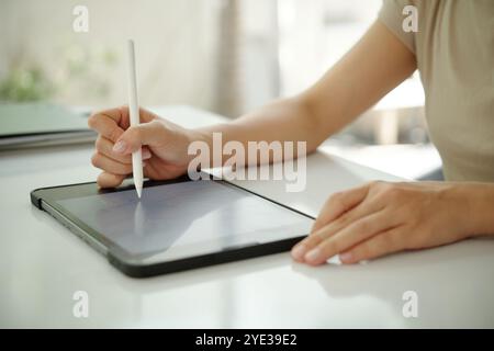 Using Digital Tablet for Creative Drawing Stock Photo