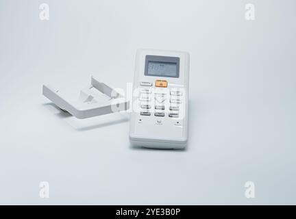 Old model remote control which is visible from its large shape, the condition of the cover is not clean. Used to turn on electronic equipment. Stock Photo