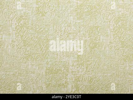 Background of green wallpaper or plaster wall with vintage swirl pattern. Stock Photo