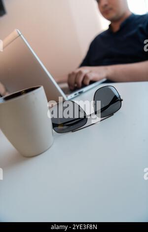 Close-up photo of a programmer typing on a laptop Stock Photo
