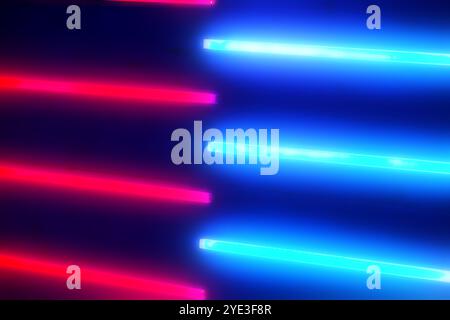 A row of neon lights in blue and red. The blue lights are on the left side of the image, while the red lights are on the right side. The lights are ar Stock Photo
