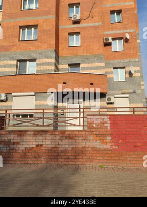 Air conditioning on red brick building wall Stock Photo - Alamy