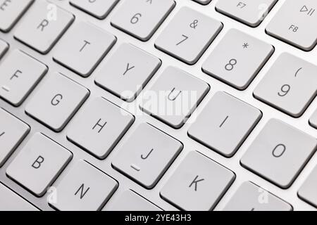 Wireless technology computer keyboard closeup view isolated on white background Stock Photo