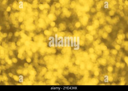Abstract seamless blurred colorful golden gold texture or pattern bokeh background Stock Photo