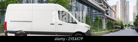 White delivery van on city street Stock Photo - Alamy