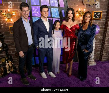 October 28, 2024, Hollywood, California, USA: (L-R) Craig Erwich, President, Disney Television Group, Hulu Originals & ABC Entertainment, David Henrie, Janice LeAnn Brown, Selena Gomez and Ayo Davis attend the World Premiere Of Disney's ''Wizards Beyond Waverly Place' (Credit Image: © Billy Bennight/ZUMA Press Wire) EDITORIAL USAGE ONLY! Not for Commercial USAGE! Stock Photo